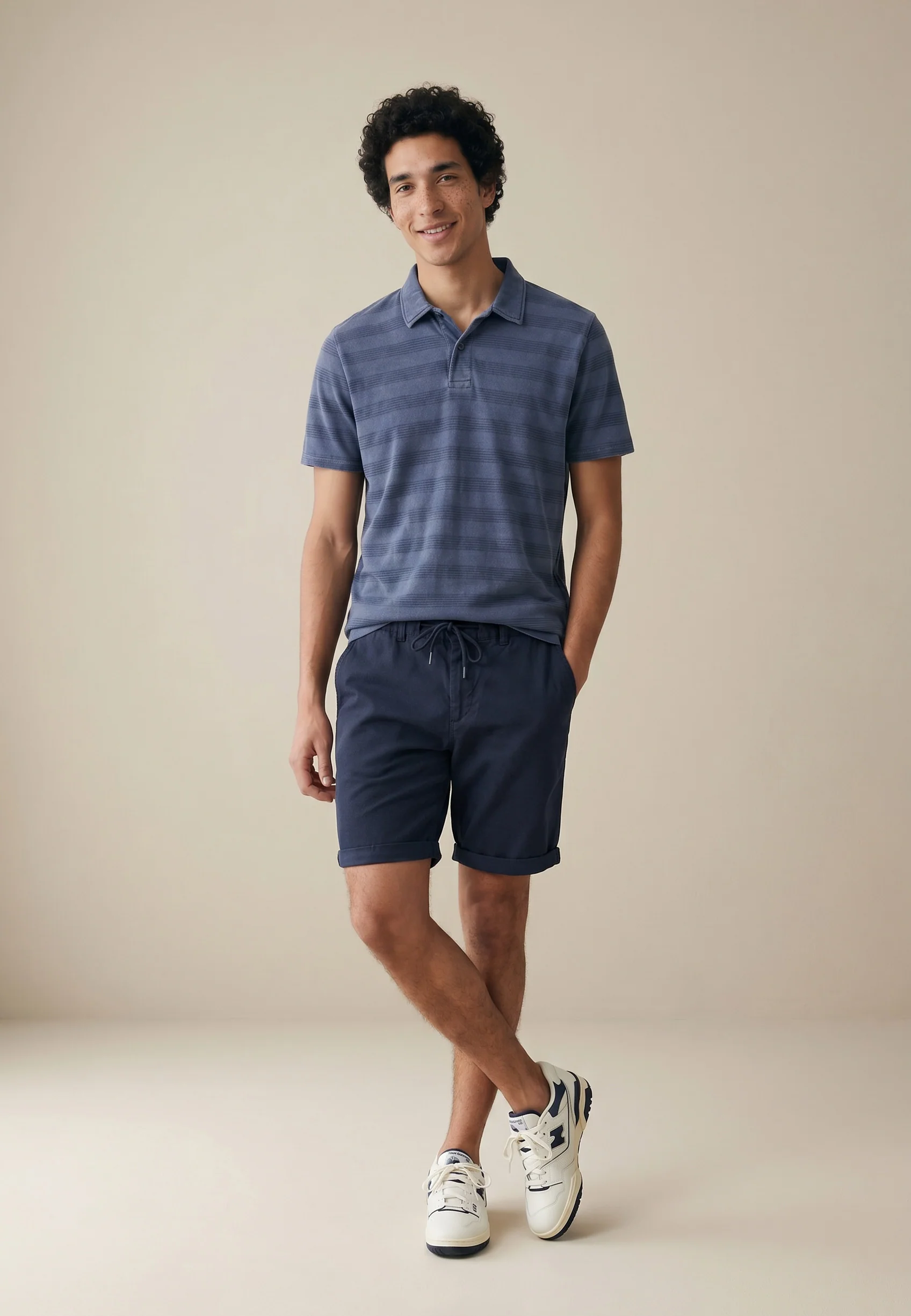 Poloshirt aus Baumwolle mit Strukturstreifen und Polokragen - Image 2